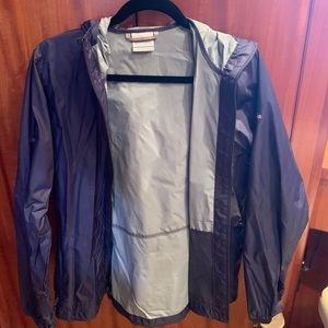 Navy blue Columbia women’s water resistant jacket.